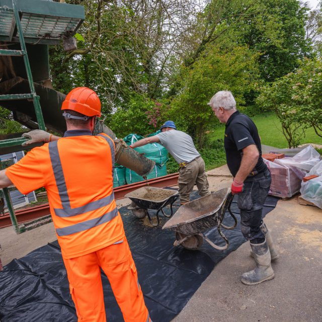 concrete in wheelbarrows