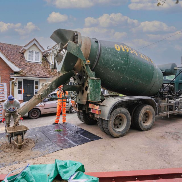 cement pour into wheelbarrow